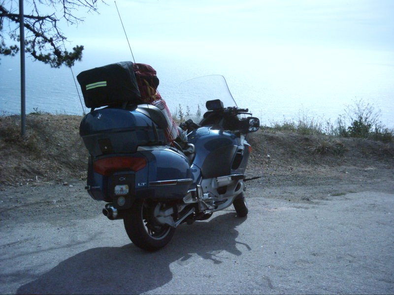 Grace parked on a Pacific Coast Highway overlook above the California coast